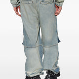 Blue pants worn by a person, showing the pants fit