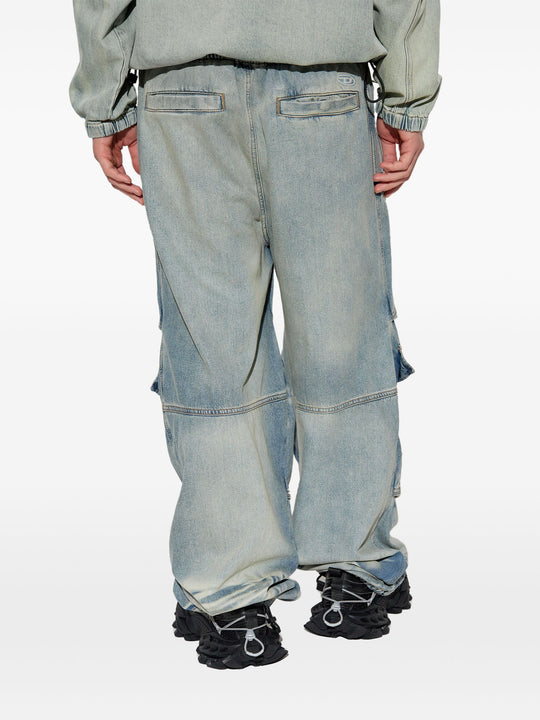 Blue pants worn by a person, showing the pants fit