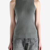 Grey tops worn by a person, showing the tops fit