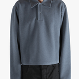 Blue jacket worn by a person, showing the jacket's fit