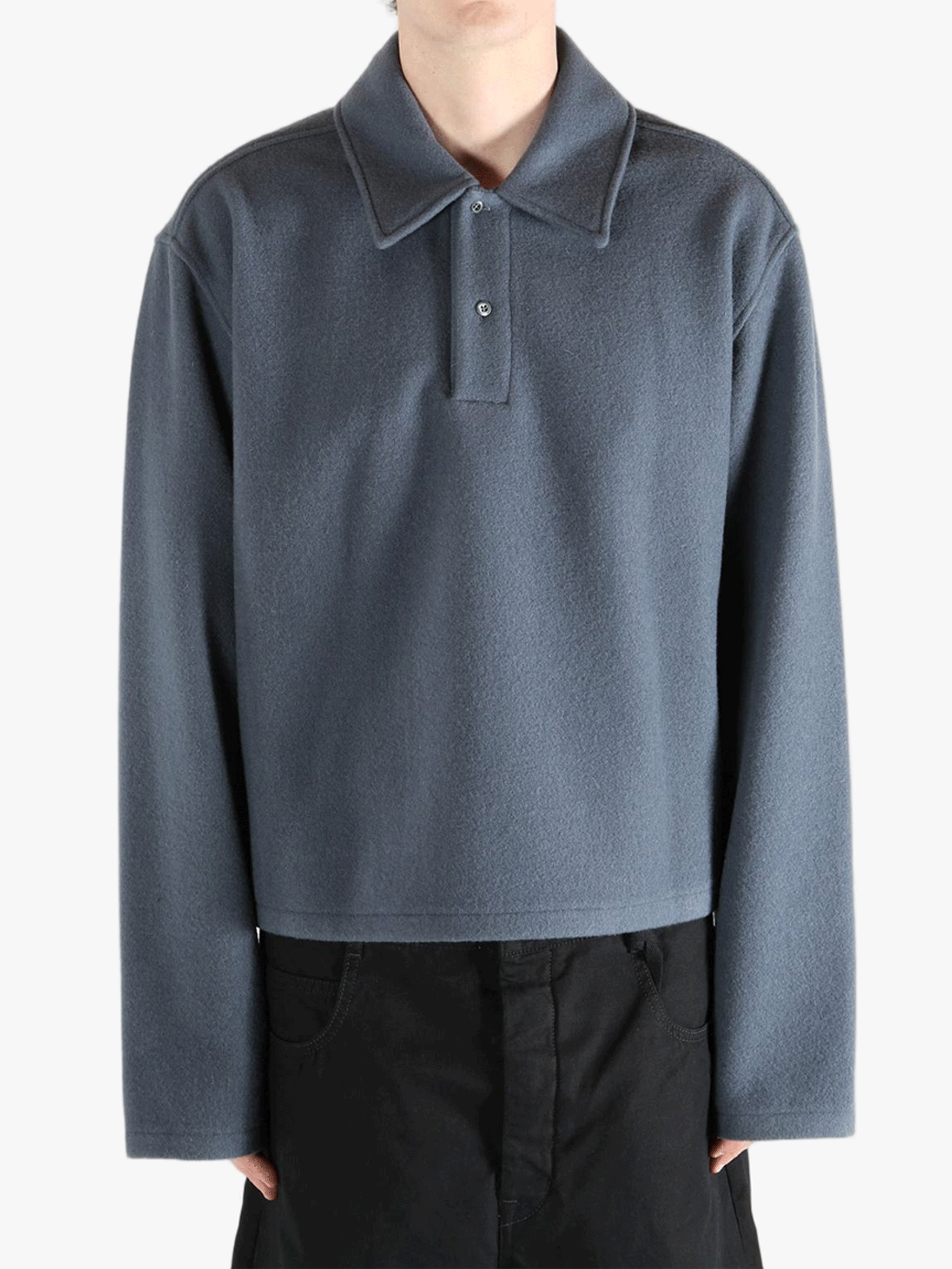 Blue jacket worn by a person, showing the jacket's fit