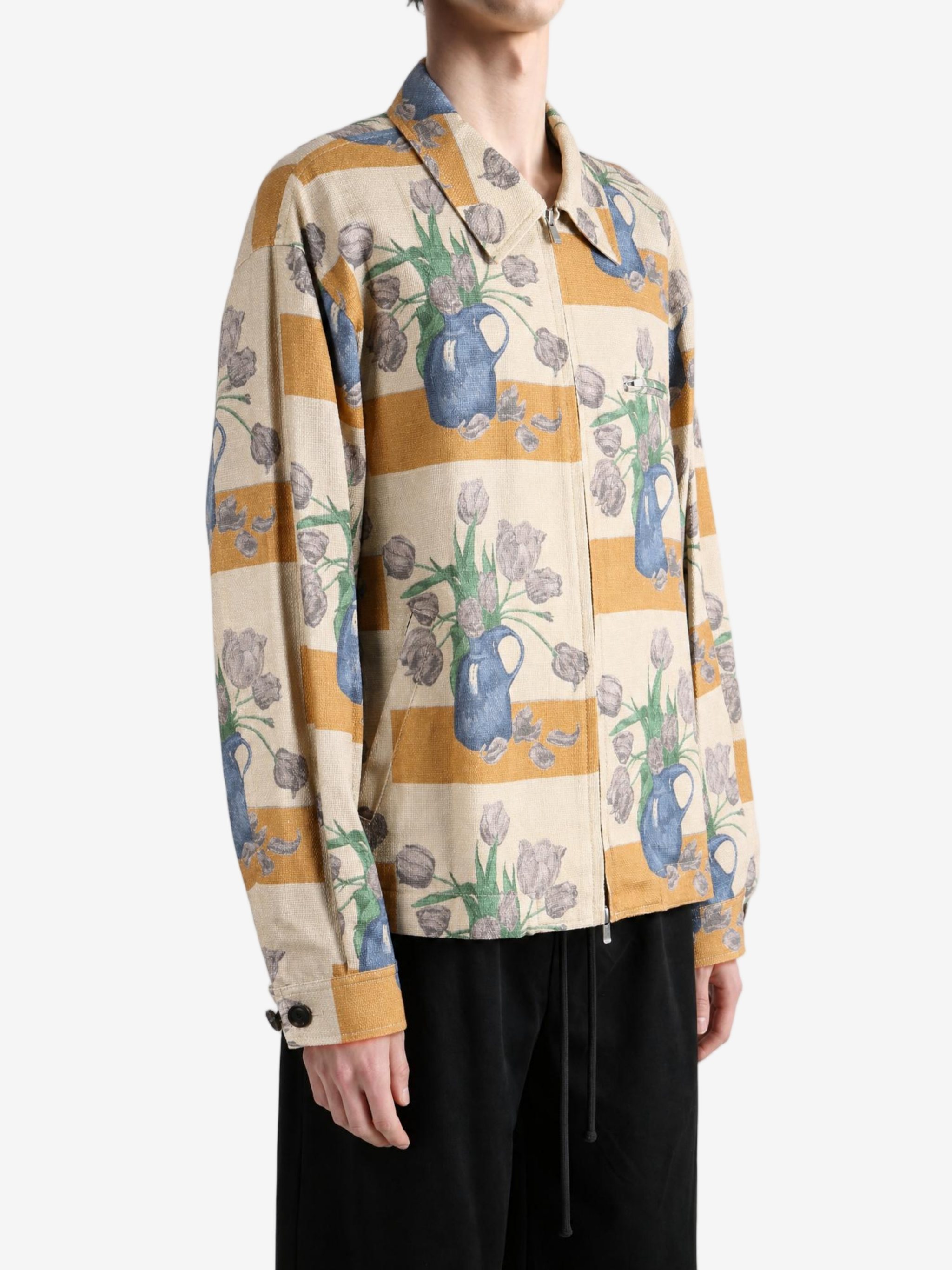 Tan jacket worn by a person, showing the jacket fit