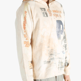 Tan hoodies worn by a person, showing the hoodies fit