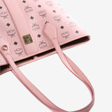 Close up of pink bag, showing texture of the fabric