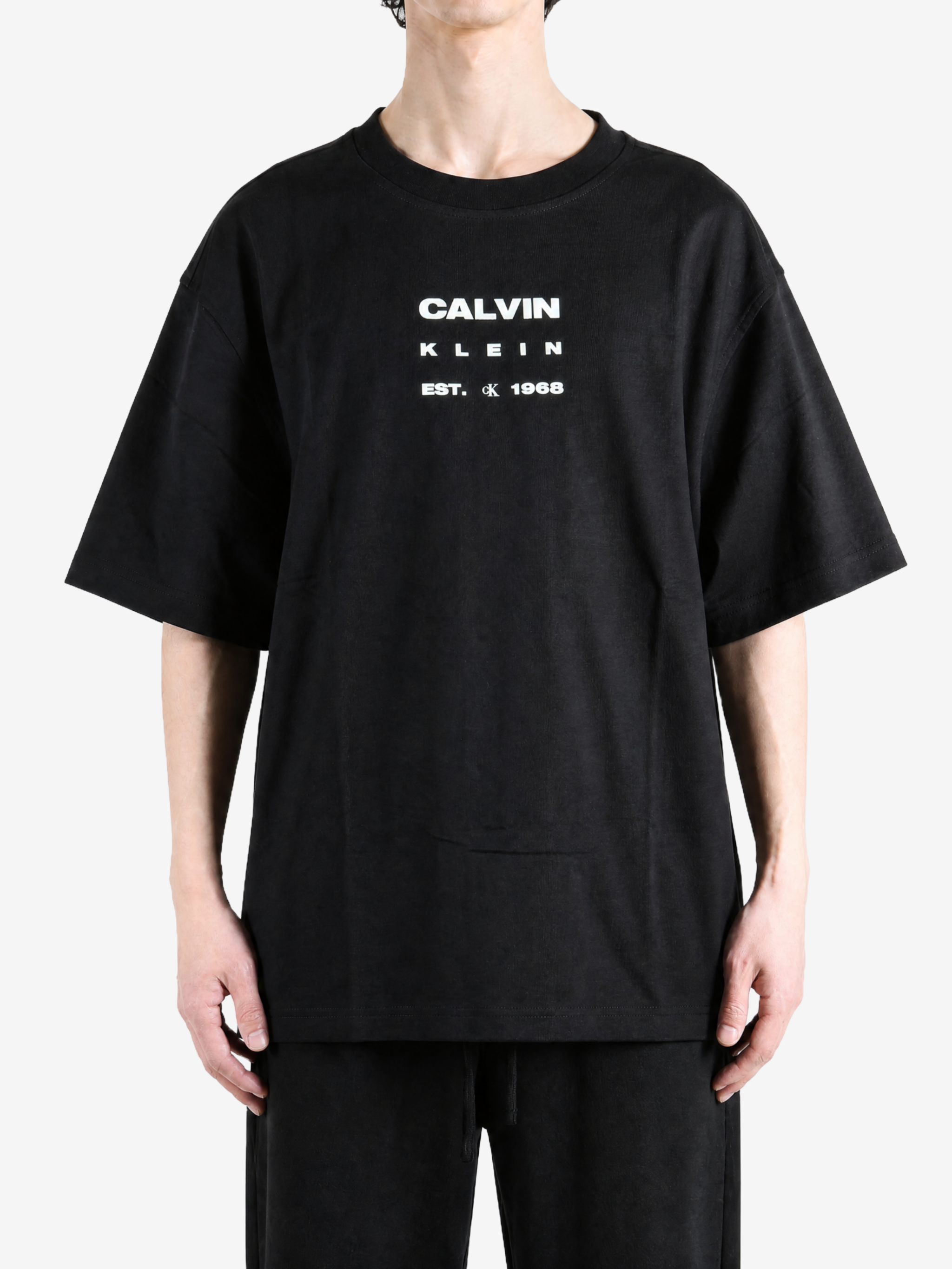 Black t-shirt, full body view