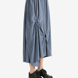 Grey skirt worn by a person, showing the skirt fit