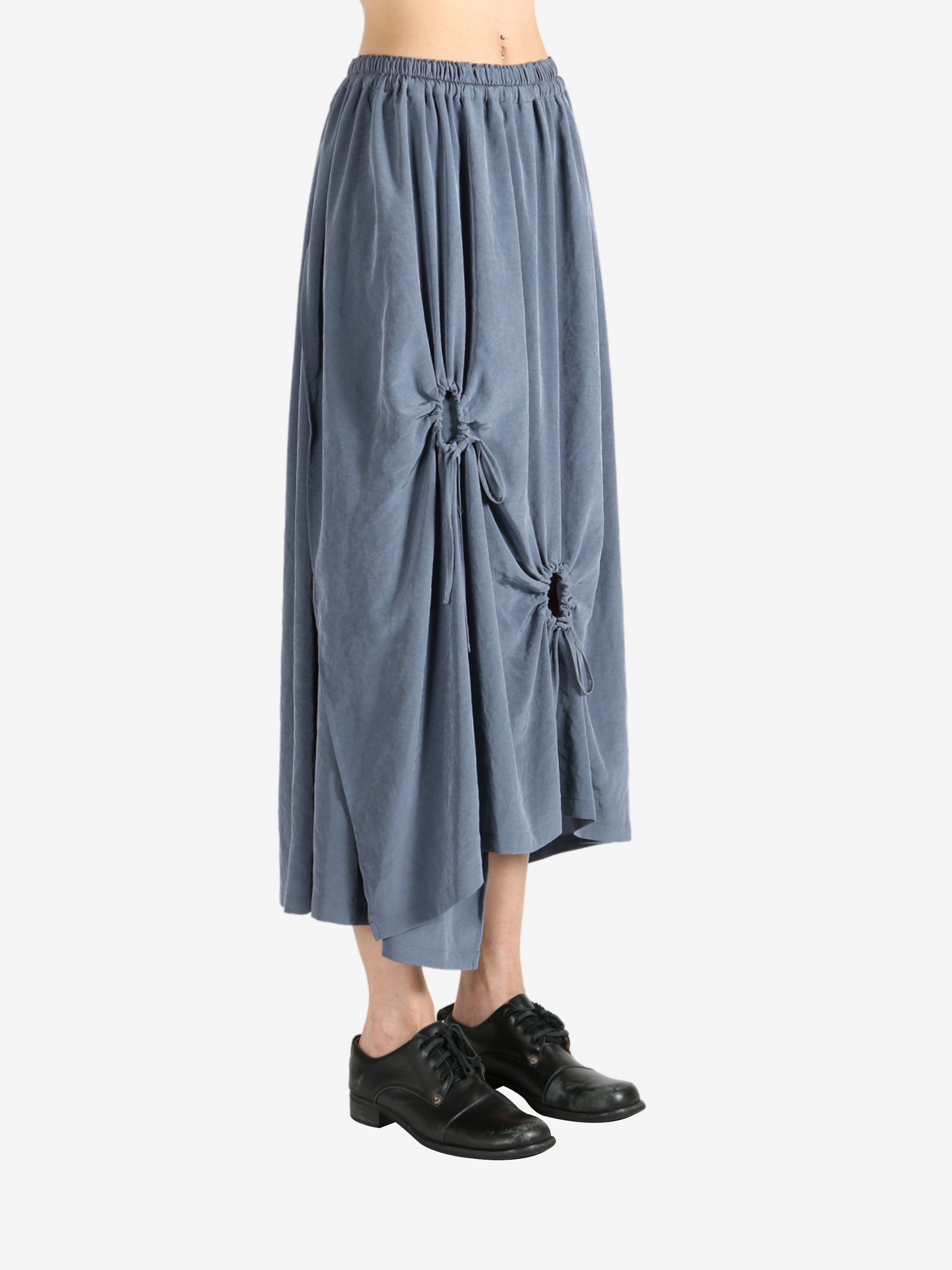 Grey skirt worn by a person, showing the skirt fit