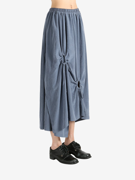 Grey skirt worn by a person, showing the skirt fit