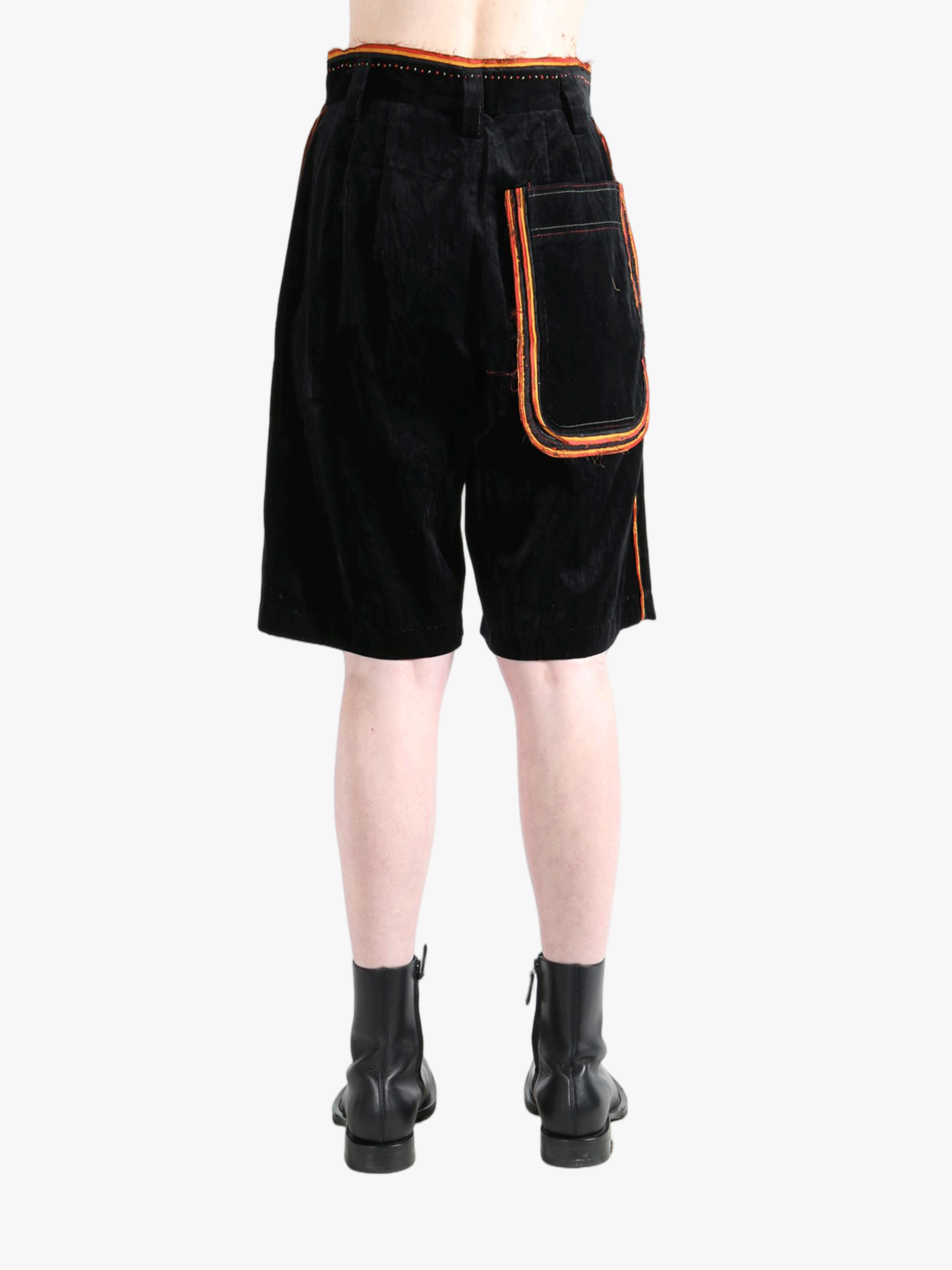 Black shorts worn by a person, showingt he short's fit