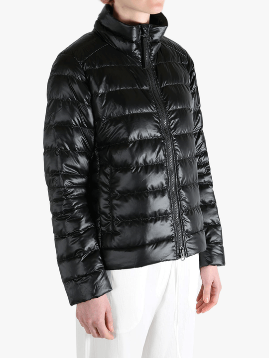 Black jacket worn by a person, showing the jacket's fit