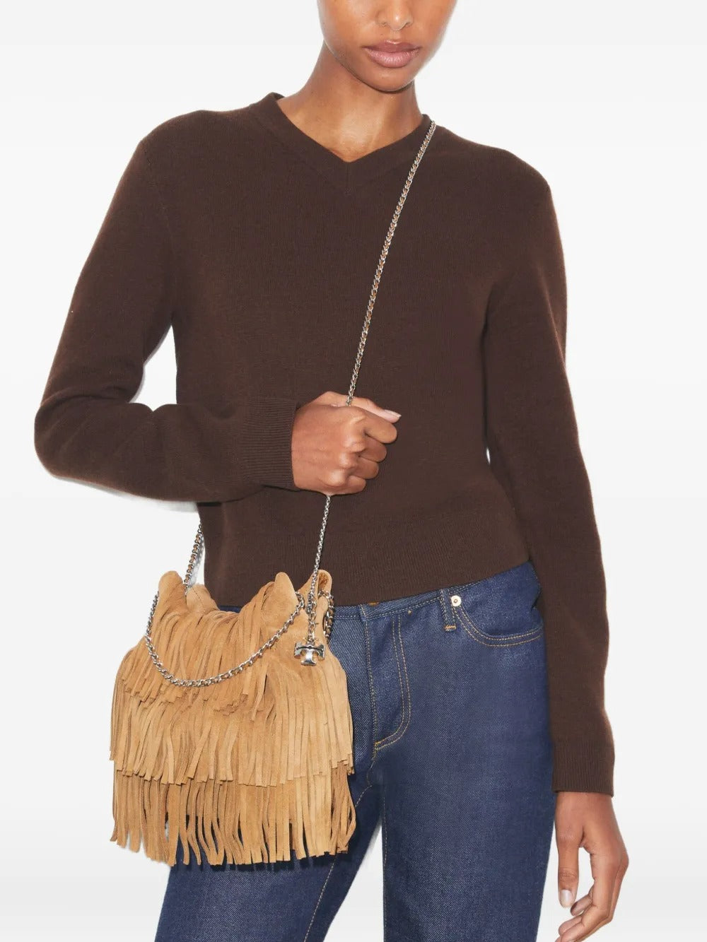 Tan bags worn by a person, showing the bags fit