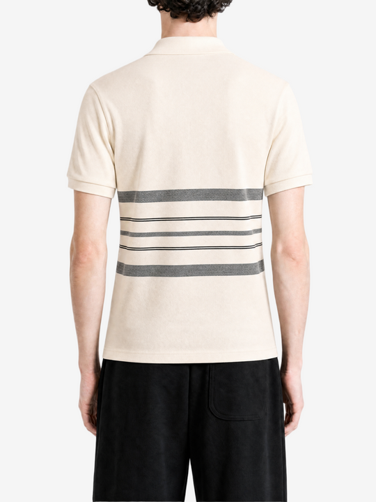 Tan shirt worn by a person, showing the shirt fit
