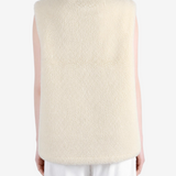 Tan top worn by a person, showing the top fit