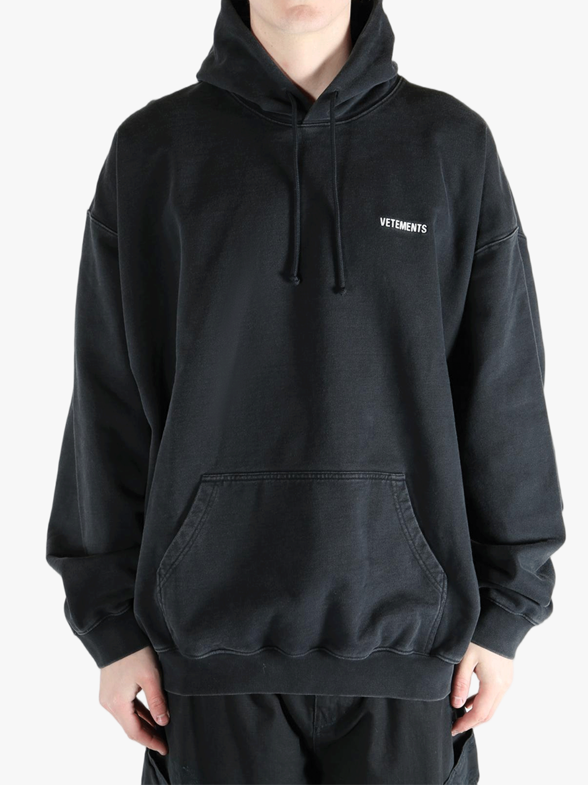 Black sweats-hoodies worn by a person, showing the fit