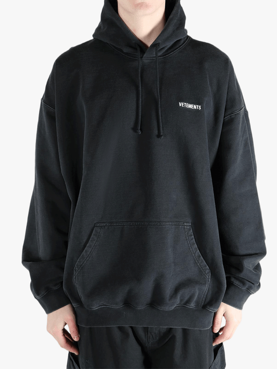 Black sweats-hoodies worn by a person, showing the fit