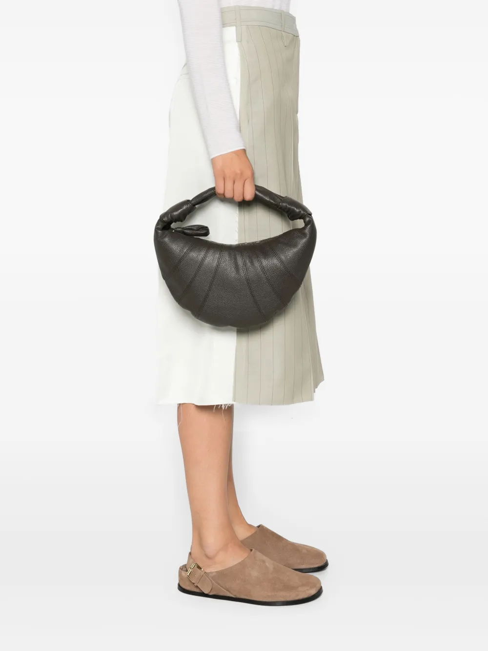 Black bag worn by a person, showing the bag's fit