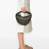 Black bag worn by a person, showing the bag's fit