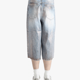 Blue shorts worn by a person, showing the shorts fit