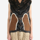 Black vest worn by a person, showing the vest fit