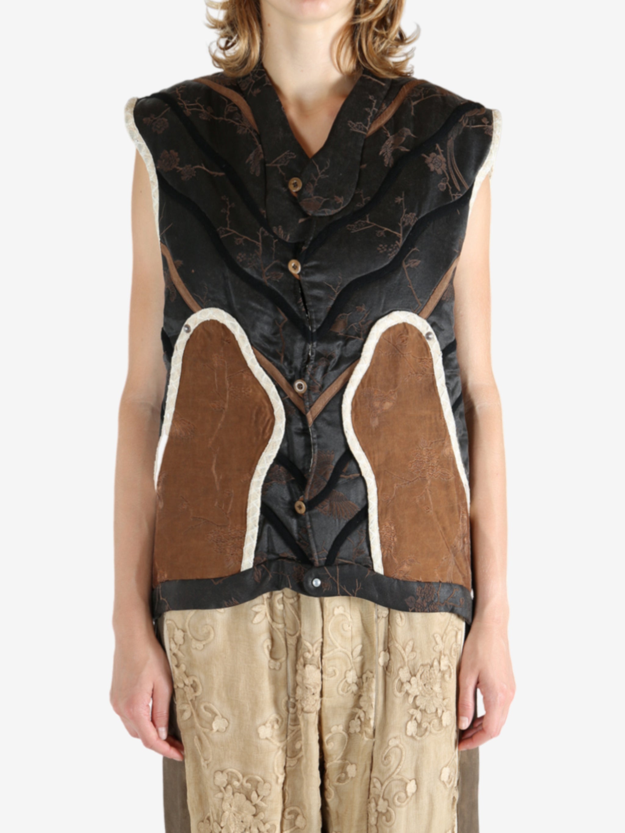 Black vest worn by a person, showing the vest fit