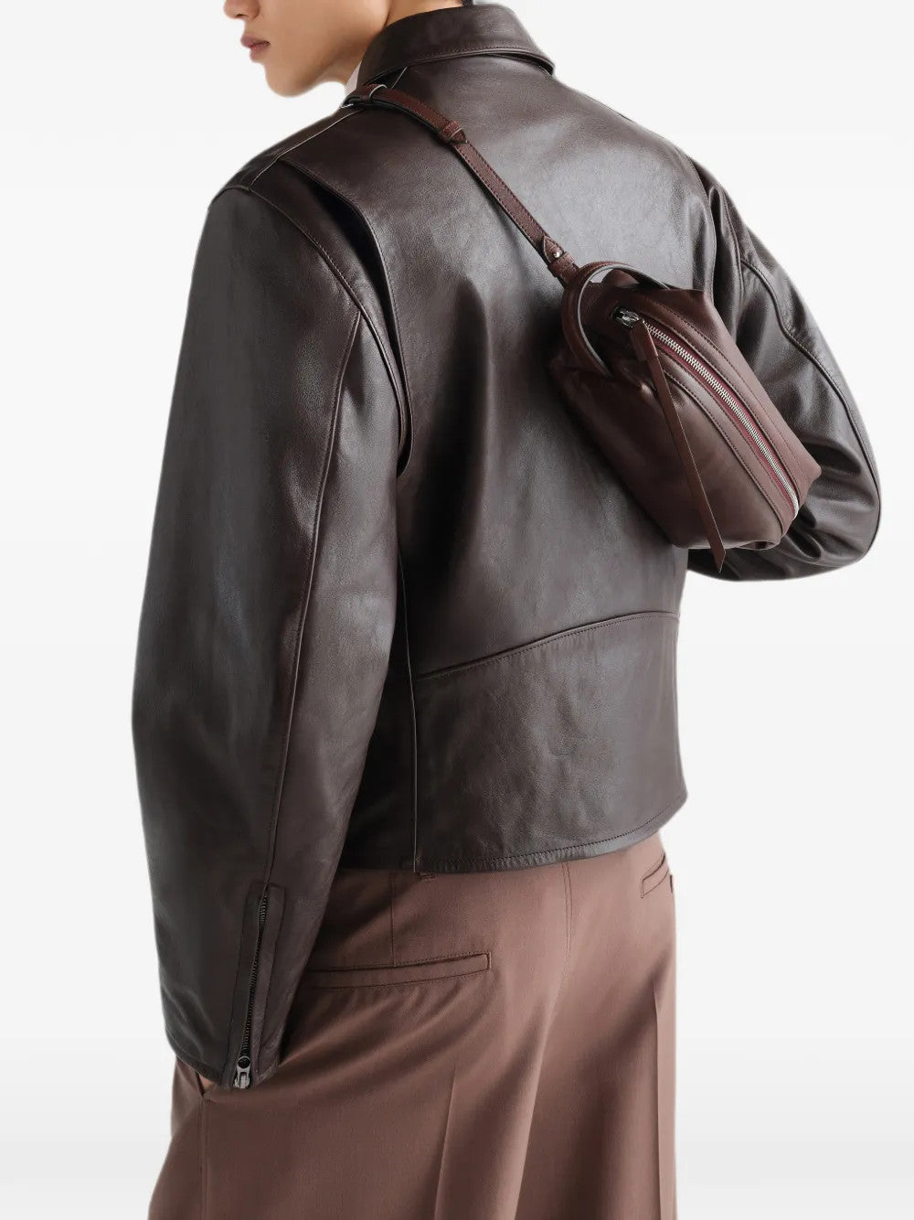 Brown bag worn by a person, showing the bag fit