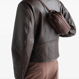 Brown bag worn by a person, showing the bag fit