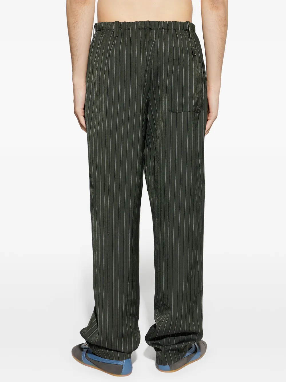 Green pant worn by a person, showing the pant's fit