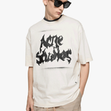 Tan t-shirt worn by a person, showing the t-shirt fit