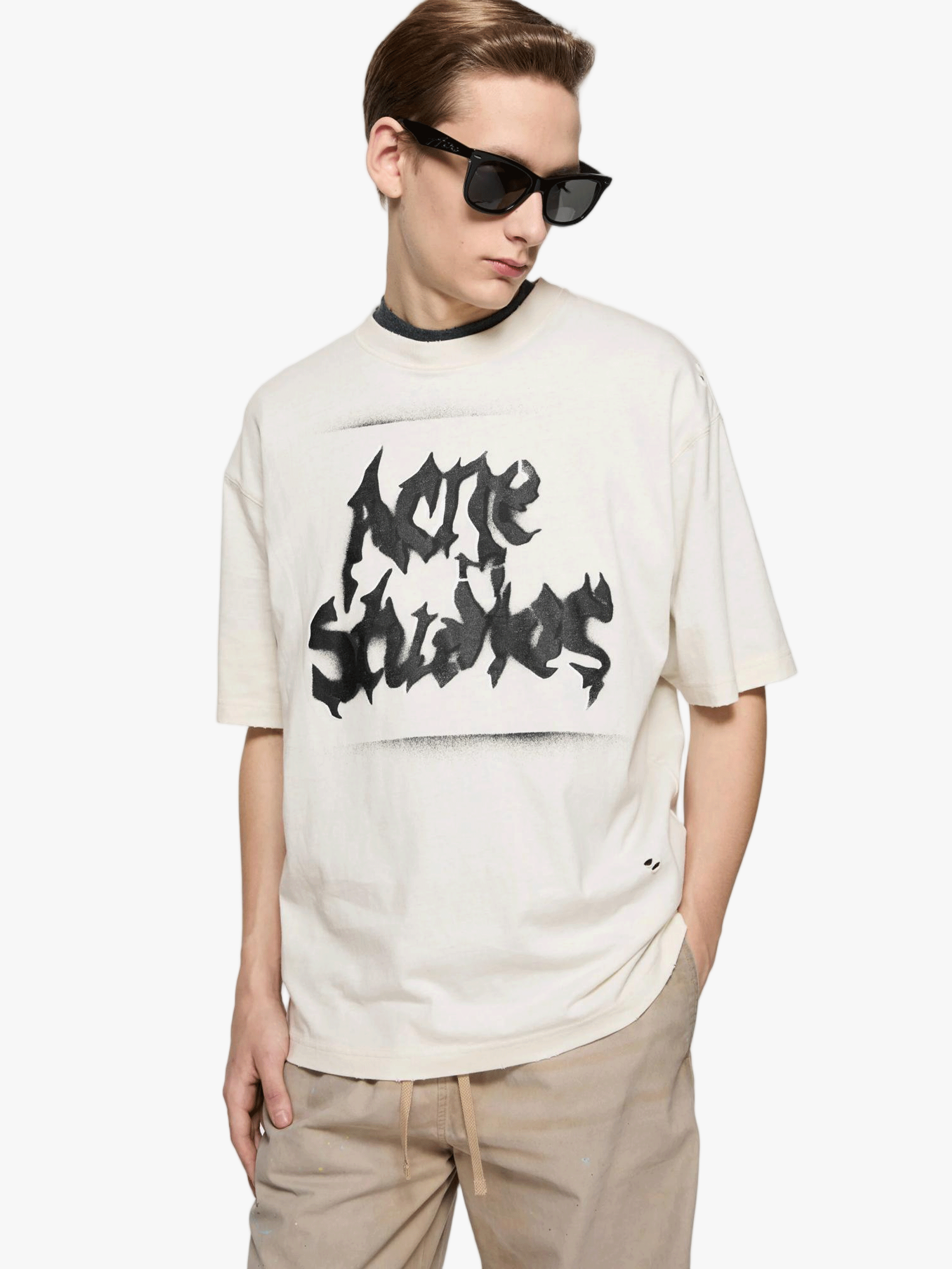Tan t-shirt worn by a person, showing the t-shirt fit