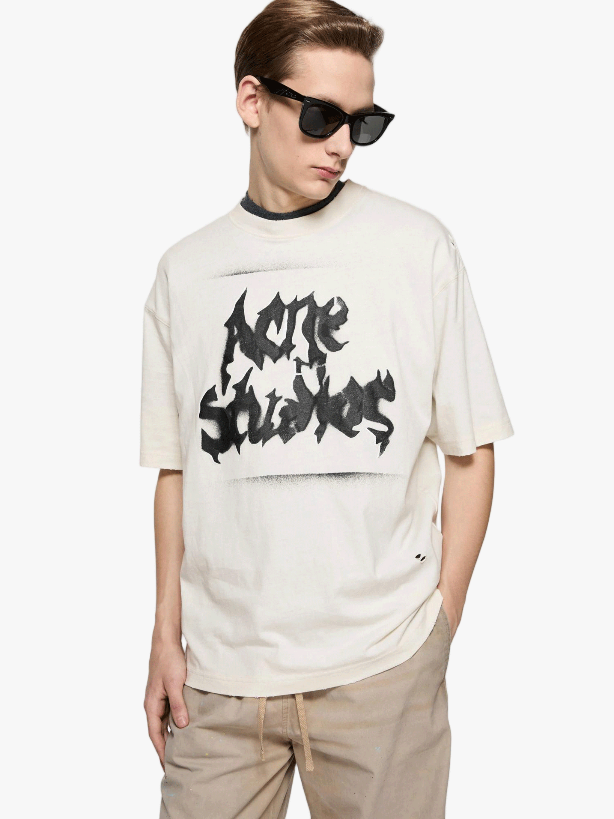 Tan t-shirt worn by a person, showing the t-shirt fit