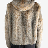 Tan jacket worn by a person, showing the jacket fit