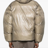 Tan jackets worn by a person, showing the jackets fit