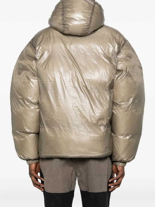 Tan jackets worn by a person, showing the jackets fit