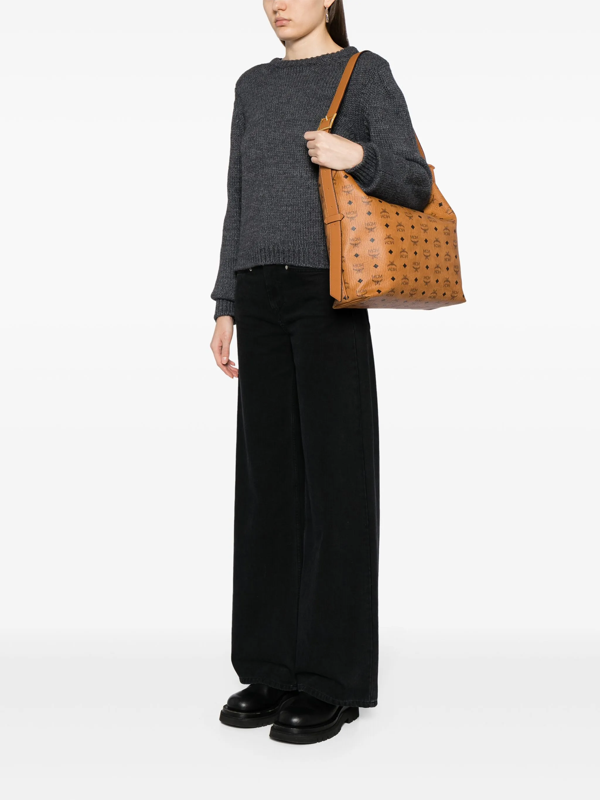 Brown bag worn by a person, showing the bag's fit