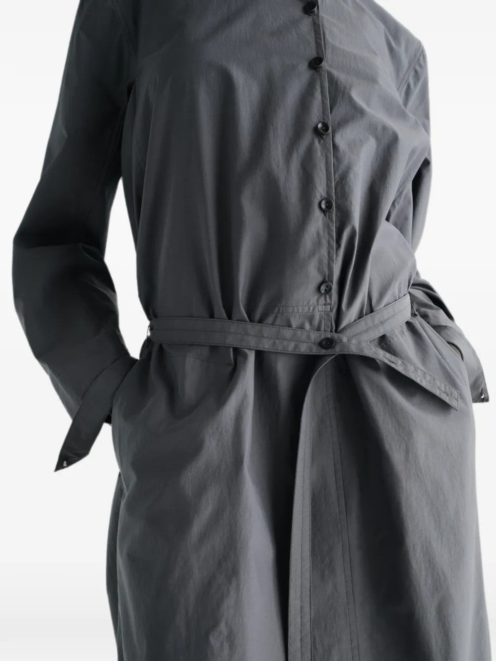 Grey dress worn by a person, showing the dress fit
