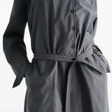 Grey dress worn by a person, showing the dress fit