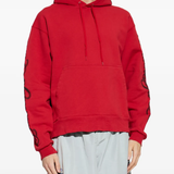 Red sweats-hoodies worn by a person, showing the cotton fit