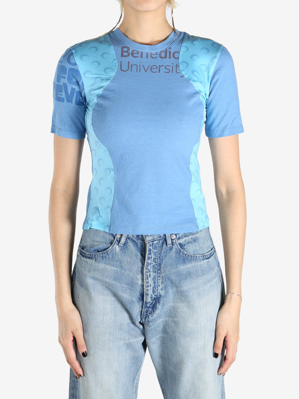 Blue t-shirts worn by a person, showing the t-shirts fit