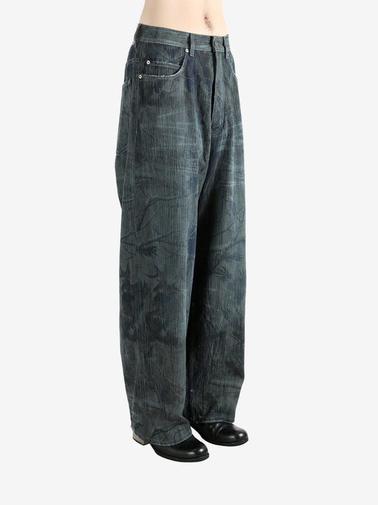 Blue jeans worn by a person, showing the jeans fit