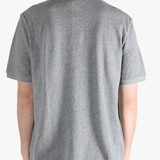 Grey t-shirt worn by a person, showing the t-shirt's fit
