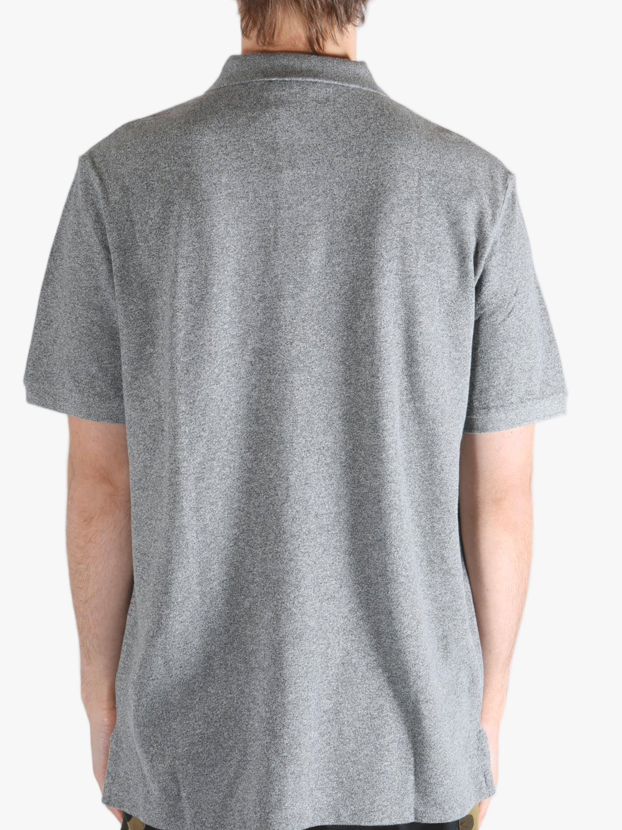 Grey t-shirt worn by a person, showing the t-shirt's fit