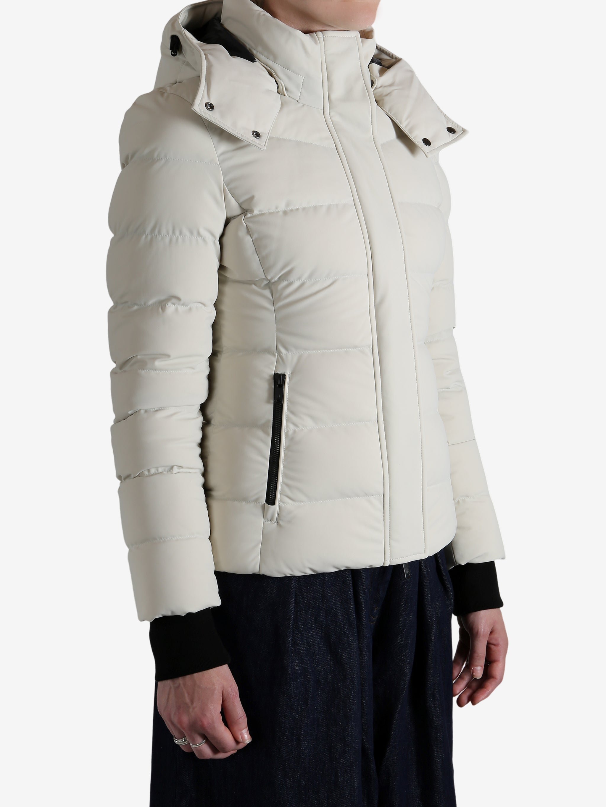 White jacket worn by a person, showing the jacket's fit