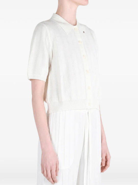 White shirt worn by a person, showing the shirt fit