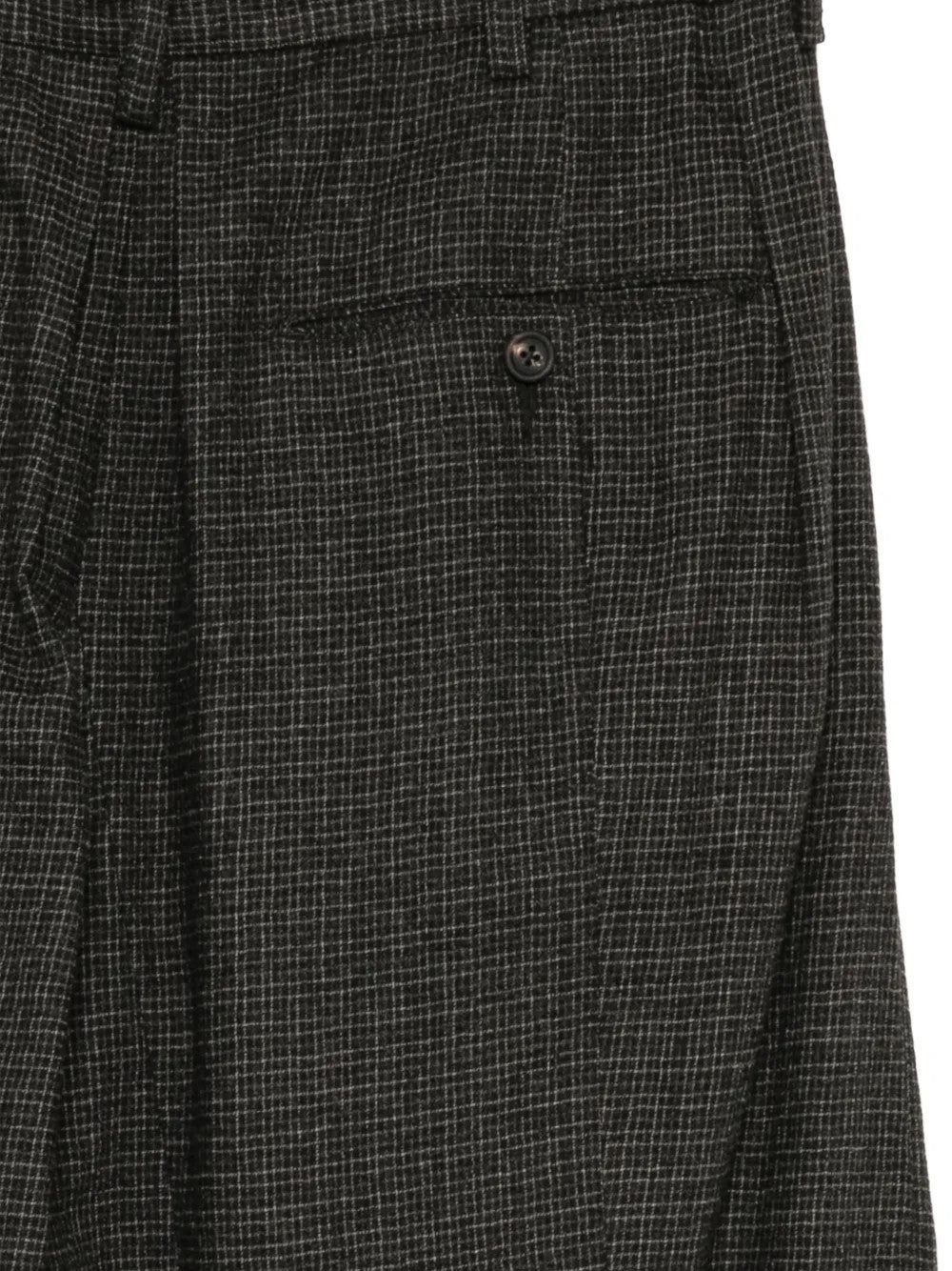 Close up of Grey pants, showing texture of the 100% wool fabric