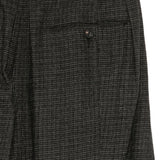 Close up of Grey pants, showing texture of the 100% wool fabric