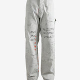 Grey pant worn by a person, showing the pant's fit