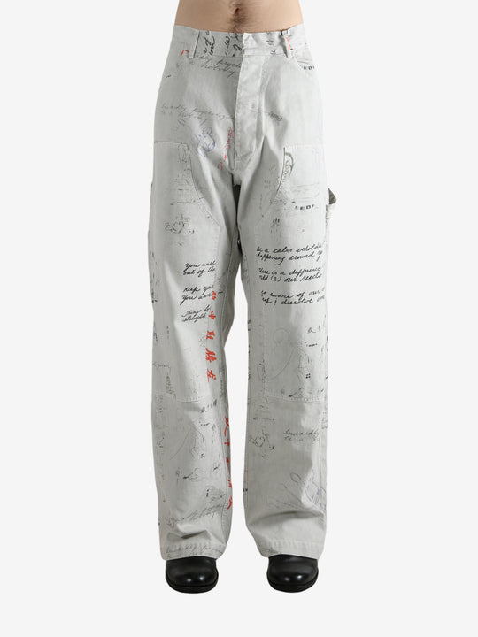 Grey pant worn by a person, showing the pant's fit