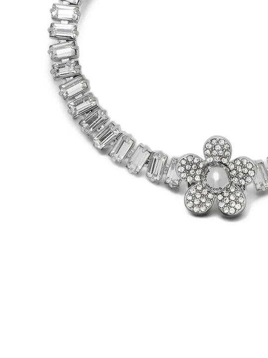 Close up of White jewelry, showing detail