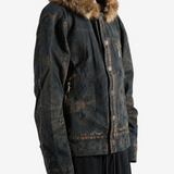 Black jacket worn by a person, showing the jacket fit