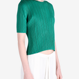 Green shirt worn by a person, showing the shirt fit